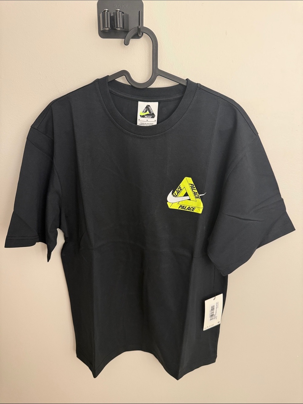 PALACE Black Tee with Neon Lime Swoosh Triangle Tag